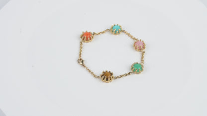 Bracelet Boules d'amour couleur pastel, turquoise, corail, opale rose, chrysophrase, œil de tigre et or jaune recyclé 18k 750/1000. Longueur 18 cm