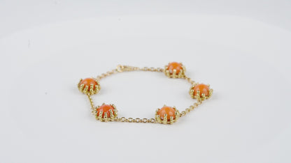 Bracelet Boules d'amour corail et or jaune recyclé 18k 750/1000.